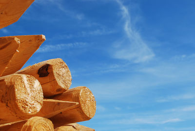 Close-up of stack against blue sky