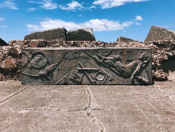 Old sculpture in front of building