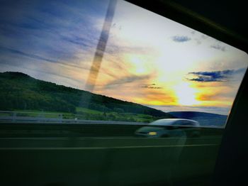 Road viewed through car window