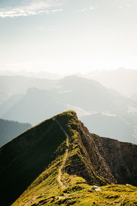 Scenic view of mountain range against sky