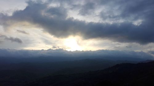 Scenic view of mountains against sky during sunset