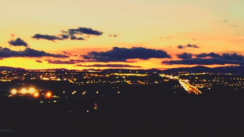 Aerial view of cityscape at sunset