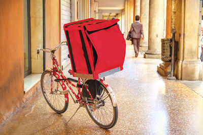 Bicycle on street against building