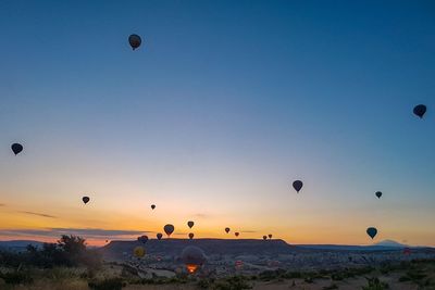 Hot air balloons flying in sky