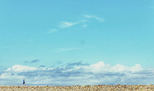 Scenic view of sea against blue sky