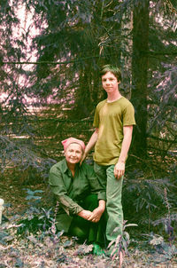 Portrait of mother and son  in a forest