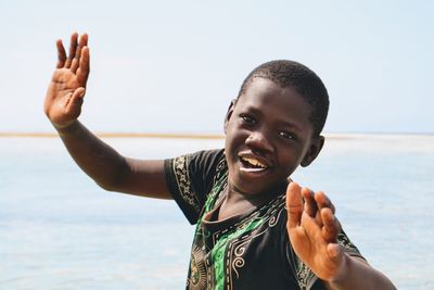 Portrait of smiling man on beach