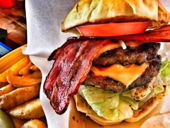 Close-up of bacon cheeseburger