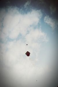 Low angle view of kite in sky