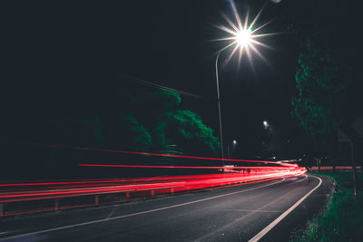 Light trails on road at night
