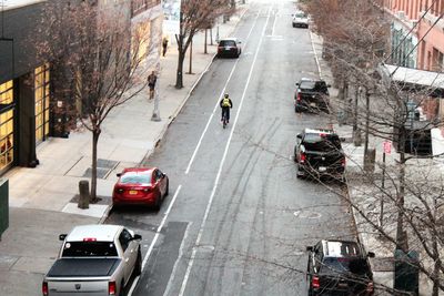 High angle view of vehicles on city street