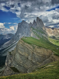 Scenic view of seceda landscape and mountains against sky