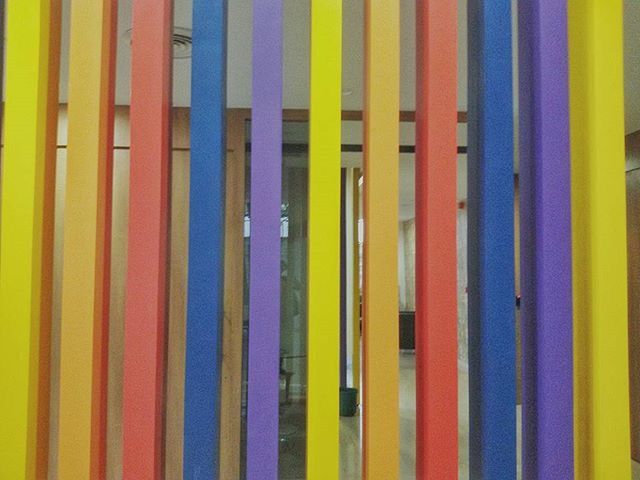 multi colored, full frame, backgrounds, yellow, pattern, colorful, striped, blue, textured, close-up, in a row, design, no people, repetition, architecture, built structure, vibrant color, abstract, day, wall - building feature