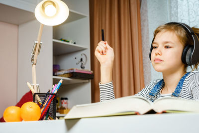 Girl studying at home