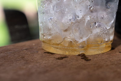 Close-up of beer glass on table