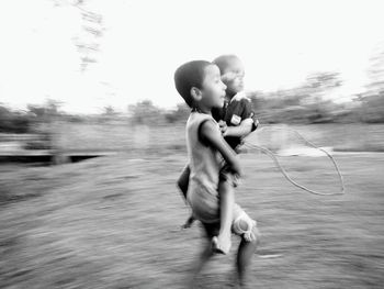 Happy siblings playing