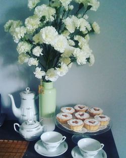 Flower vase on table