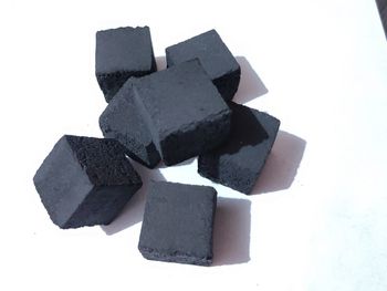 Close-up of stack of stones against white background