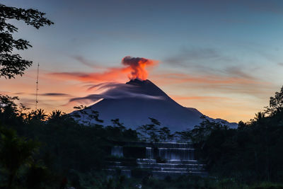 Scenic view of mountains against sky during sunset