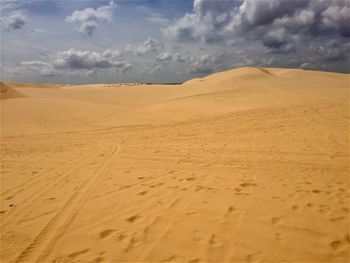 Scenic view of desert against sky