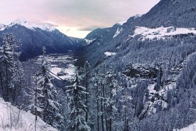 Scenic view of snow covered mountains