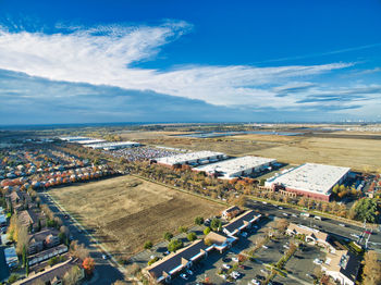High angle view of buildings in city against sky