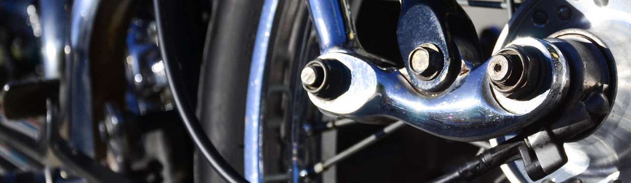 CLOSE-UP OF BICYCLE WHEEL IN CONTAINER