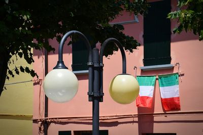 Old street lights against building