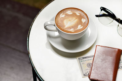 Close-up of cappuccino on table