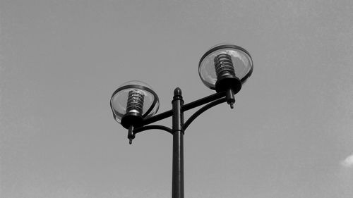 Low angle view of street light against clear sky