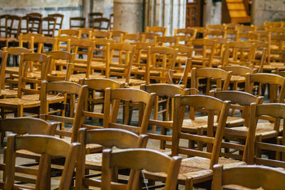 Empty chairs and tables in restaurant