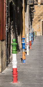 Traffic cones on road in city