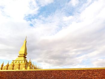 View of temple against cloudy sky