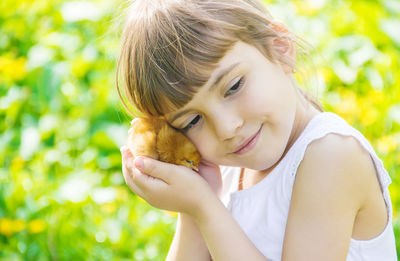 Side view of young woman looking away