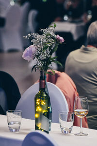 Flower vase on table at home