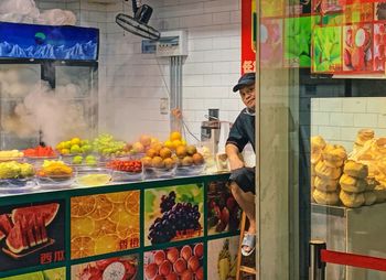 Man working at market stall