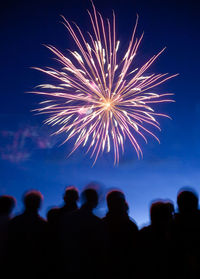 Crowd watching fireworks and celebrating