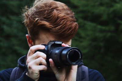 Portrait of man photographing