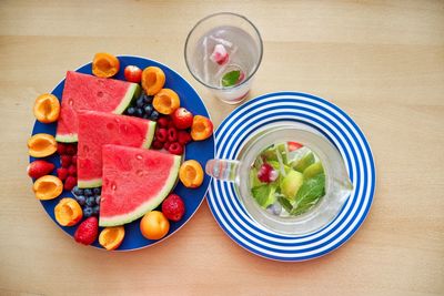 High angle view of fruits in plate on table