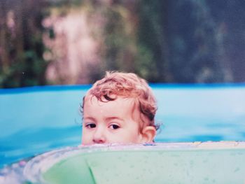Portrait of woman in swimming pool