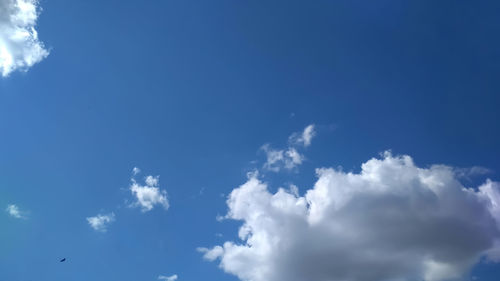 Low angle view of clouds in blue sky