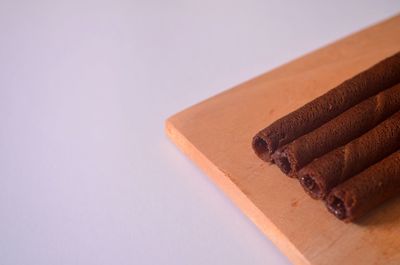 Close-up of chocolate cake against white background