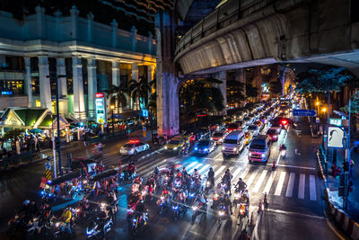 High angle view of traffic on city street at night