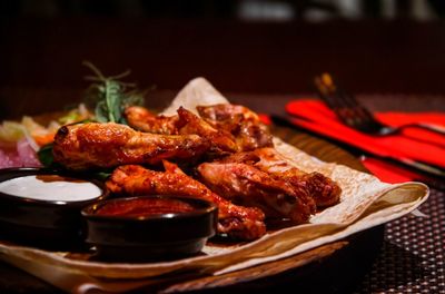 Close-up of served food in plate on table