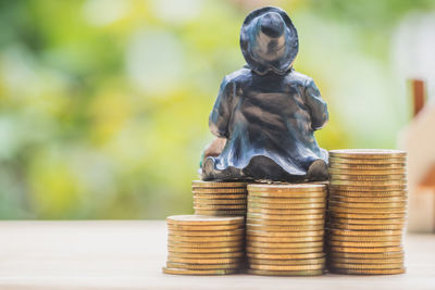 Close-up of statue of stack on table