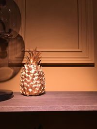 Close-up of christmas decoration on table at home