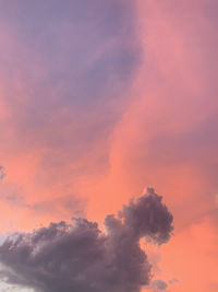 Low angle view of dramatic sky during sunset