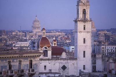 View of buildings in city against sky