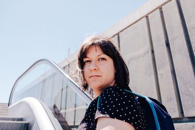 Portrait of woman against sky