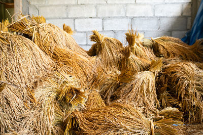 Stack of hay bales on field